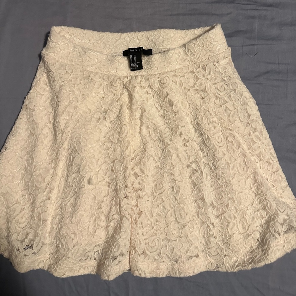 White lacy mini skirt